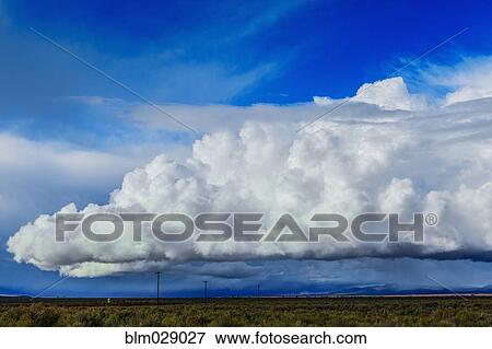 Storm clouds moving across rural prairie, Orovada, Nevada, United States View Large Photo Image Stock Photo - Storm clouds moving across rural prairie, Orovada, Nevada, United States. Fotosearch