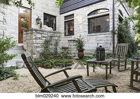 Table and chairs in backyard View Large Photo Image Stock Image - Table and chairs in backyard. Fotosearch