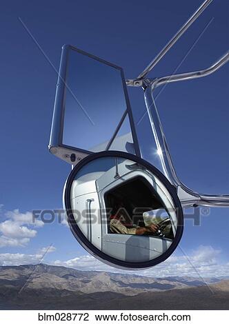 Trucker reflected in side mirror View Large Photo Image Stock Image - Trucker reflected in side mirror. Fotosearch