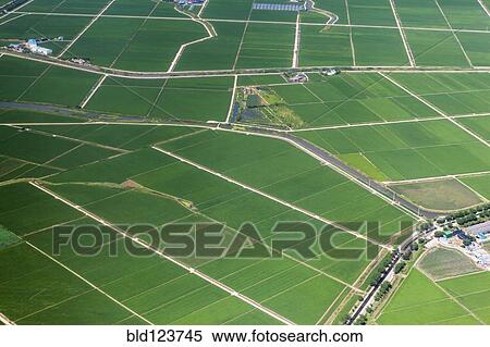 Aerial view of rural farmland View Large Photo Image Stock Photography - Aerial view of rural farmland. Fotosearch