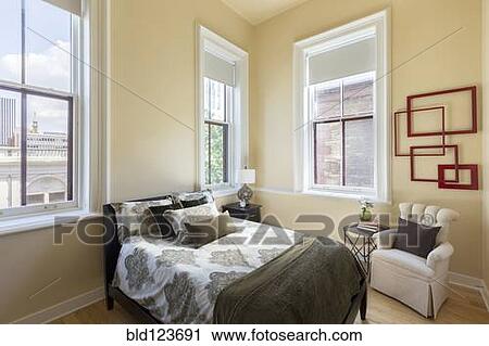 Bed and armchair in bedroom View Large Photo Image Stock Image - Bed and armchair in bedroom. Fotosearch