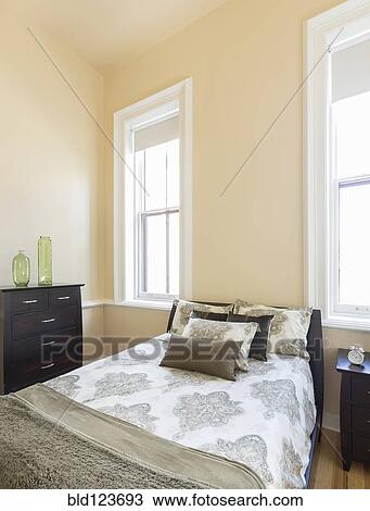 Bed and dresser in bedroom View Large Photo Image Stock Image - Bed and dresser in bedroom. Fotosearch