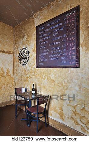 Blackboard and table in wine bar View Large Photo Image Stock Photo - Blackboard and table in wine bar. Fotosearch