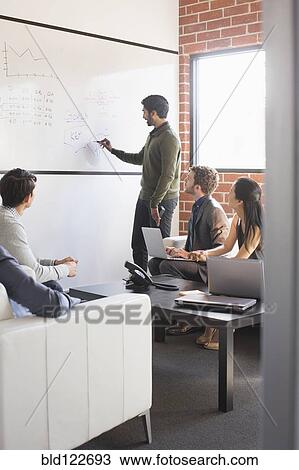 Business people talking in meeting View Large Photo Image Stock Image - Business people talking in meeting. Fotosearch