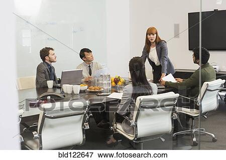 Business people talking in meeting View Large Photo Image Stock Photo - Business people talking in meeting. Fotosearch