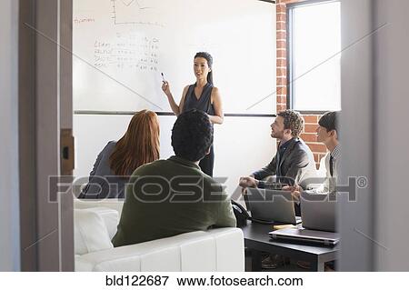 Business people talking in meeting View Large Photo Image Stock Photo - Business people talking in meeting. Fotosearch