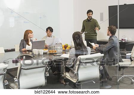 Picture - Business people working in office. Fotosearch