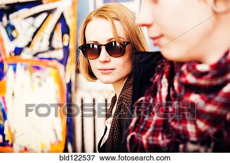 Caucasian woman wearing sunglasses indoors View Large Photo Image Stock Photo - Caucasian woman wearing sunglasses indoors. Fotosearch