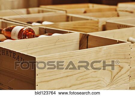 Picture - Close up of crates of wine bottles. Fotosearch