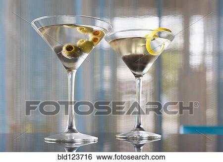 Stock Photograph - Close up of garnished martinis. Fotosearch