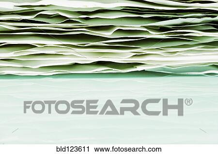 Stock Image - Close up of stacked papers. Fotosearch