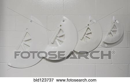Close up of surgery cones hanging on wall in animal hospital View Large Photo Image Stock Photo - Close up of surgery cones hanging on wall in animal hospital. Fotosearch