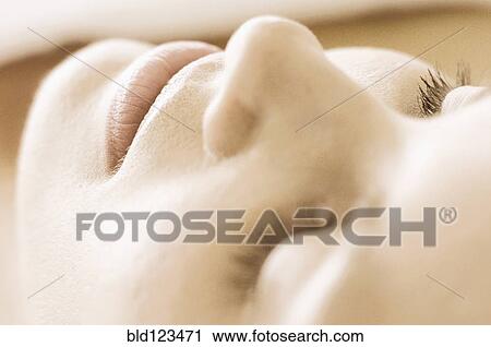 Stock Image - Close up of woman's eyelashes. Fotosearch