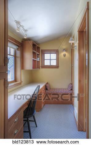 Desk and chair in attic space View Large Photo Image Stock Image - Desk and chair in attic space. Fotosearch