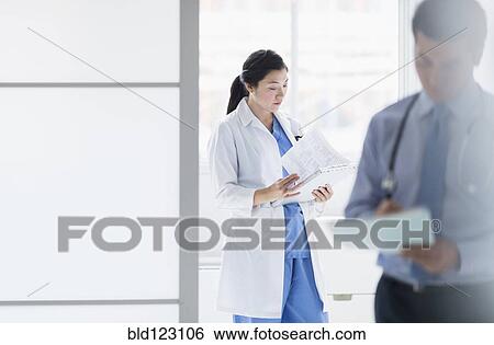 Stock Photograph - Doctors working in hospital. Fotosearch