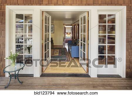 Glass doors on wooden patio View Large Photo Image Picture - Glass doors on wooden patio. Fotosearch