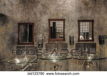 Stock Image - Glass sinks and mirrors in bathroom. Fotosearch