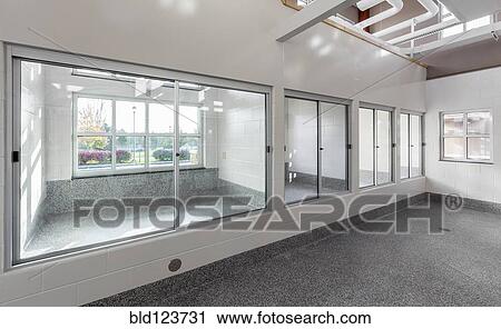 Glass windows to holding areas in animal shelter View Large Photo Image Stock Image - Glass windows to holding areas in animal shelter. Fotosearch