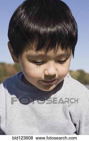 Hispanic boy outdoors View Large Photo Image Stock Photo - Hispanic boy outdoors. Fotosearch
