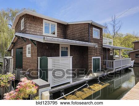 Houseboat on canal View Large Photo Image Stock Photography - Houseboat on canal. Fotosearch