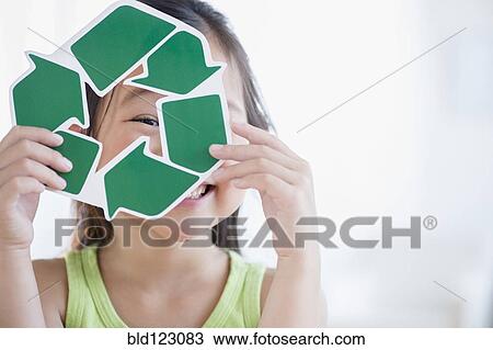 Korean girl holding recycle symbol View Large Photo Image Stock Image - Korean girl holding recycle symbol. Fotosearch