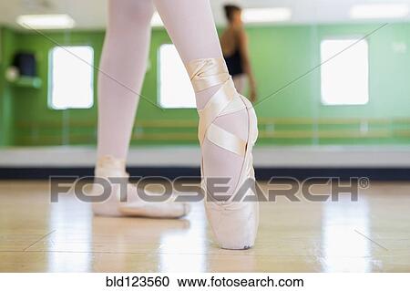 Mixed race ballerina practicing in studio View Large Photo Image Stock Image - Mixed race ballerina practicing in studio. Fotosearch