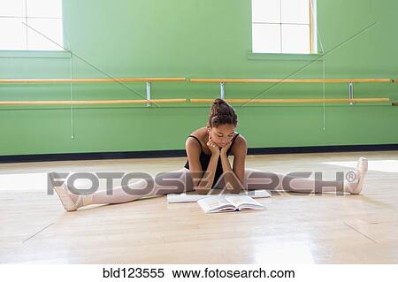 Mixed race ballerina studying in studio View Large Photo Image Stock Photography - Mixed race ballerina studying in studio. Fotosearch
