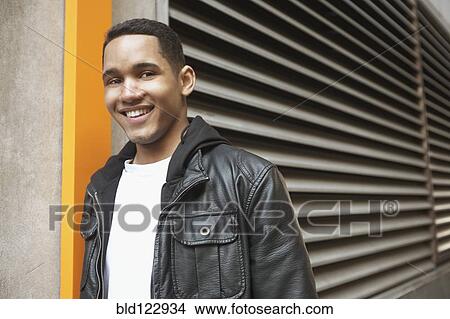 Mixed race man outdoors View Large Photo Image Picture - Mixed race man outdoors. Fotosearch