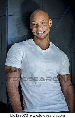 Mixed race man smiling View Large Photo Image Stock Image - Mixed race man smiling. Fotosearch