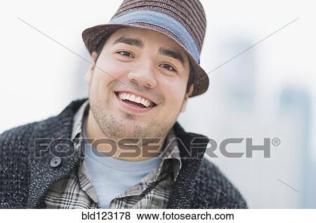 Stock Photo - Mixed race man smiling. Fotosearch