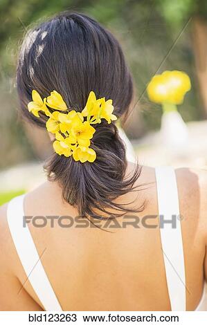 Newlywed bride with flowers in hair View Large Photo Image Stock Image - Newlywed bride with flowers in hair. Fotosearch