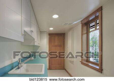 Sink in empty utility room View Large Photo Image Stock Photography - Sink in empty utility room. Fotosearch