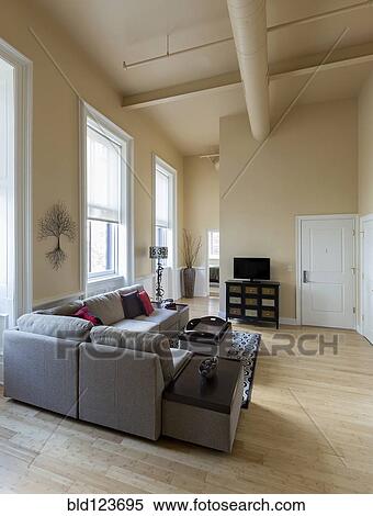 Stock Photography - Sofa and coffee table in modern living room. Fotosearch