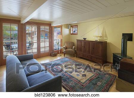 Sofa and rug in living room View Large Photo Image Stock Photograph - Sofa and rug in living room. Fotosearch