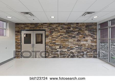 Stone wall in lobby of animal shelter View Large Photo Image Picture - Stone wall in lobby of animal shelter. Fotosearch