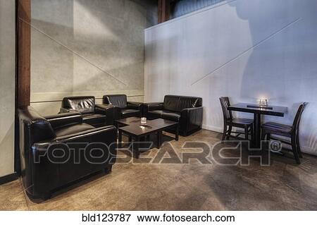 Tables and chairs in empty restaurant View Large Photo Image Stock Photo - Tables and chairs in empty restaurant. Fotosearch
