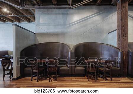 Tables and chairs in empty restaurant View Large Photo Image Stock Photograph - Tables and chairs in empty restaurant. Fotosearch
