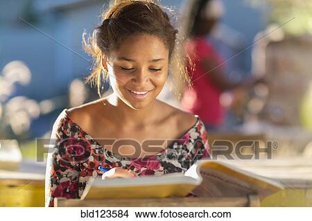 Teenager doing homework View Large Photo Image Picture - Teenager doing homework. Fotosearch