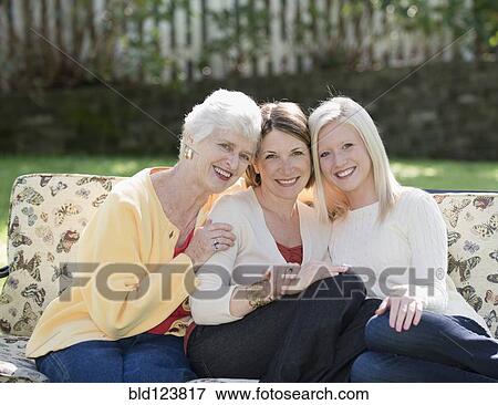 Three generations of Caucasian women smiling outdoors View Large Photo Image Stock Photo - Three generations of Caucasian women smiling outdoors. Fotosearch