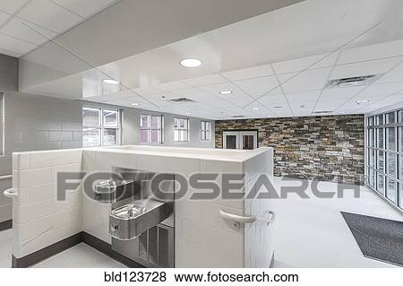Stock Photo - Water fountains in lobby of animal shelter. Fotosearch