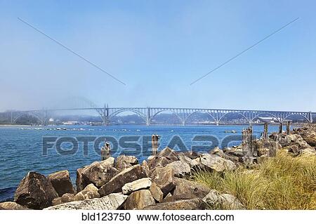 Yaquina Bay Bridge, Newport, Oregon, United States View Large Photo Image Stock Image - Yaquina Bay Bridge, Newport, Oregon, United States. Fotosearch