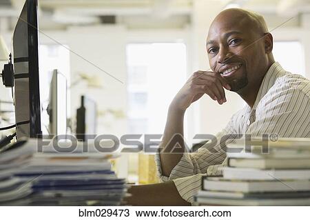 African American businessman smiling in office View Large Photo Image Stock Image - African American businessman smiling in office. Fotosearch