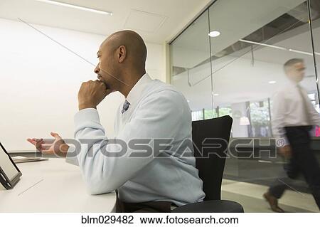 African American businessman talking in meeting View Large Photo Image Stock Image - African American businessman talking in meeting. Fotosearch
