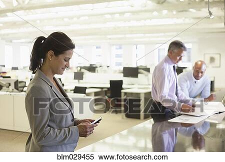 Business people working in office View Large Photo Image Stock Photography - Business people working in office. Fotosearch