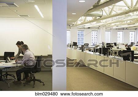 Caucasian business people talking in meeting View Large Photo Image Stock Image - Caucasian business people talking in meeting. Fotosearch