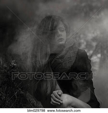 Caucasian woman in fog outdoors View Large Photo Image Stock Photo - Caucasian woman in fog outdoors. Fotosearch