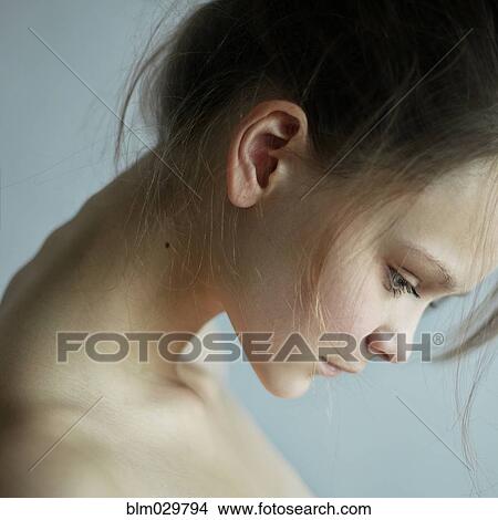Caucasian woman looking down View Large Photo Image Picture - Caucasian woman looking down. Fotosearch