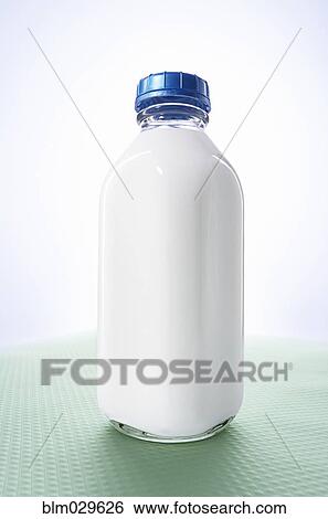 Close up of bottle of milk View Large Photo Image Stock Photograph - Close up of bottle of milk. Fotosearch