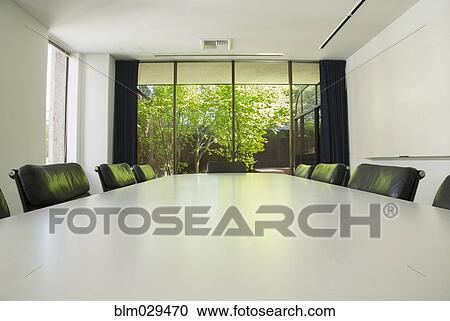 Empty table in meeting room View Large Photo Image Stock Image - Empty table in meeting room. Fotosearch