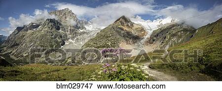 Stock Photo - Mt Blanc trail in mountains, Val Ferret, Switzerland. Fotosearch